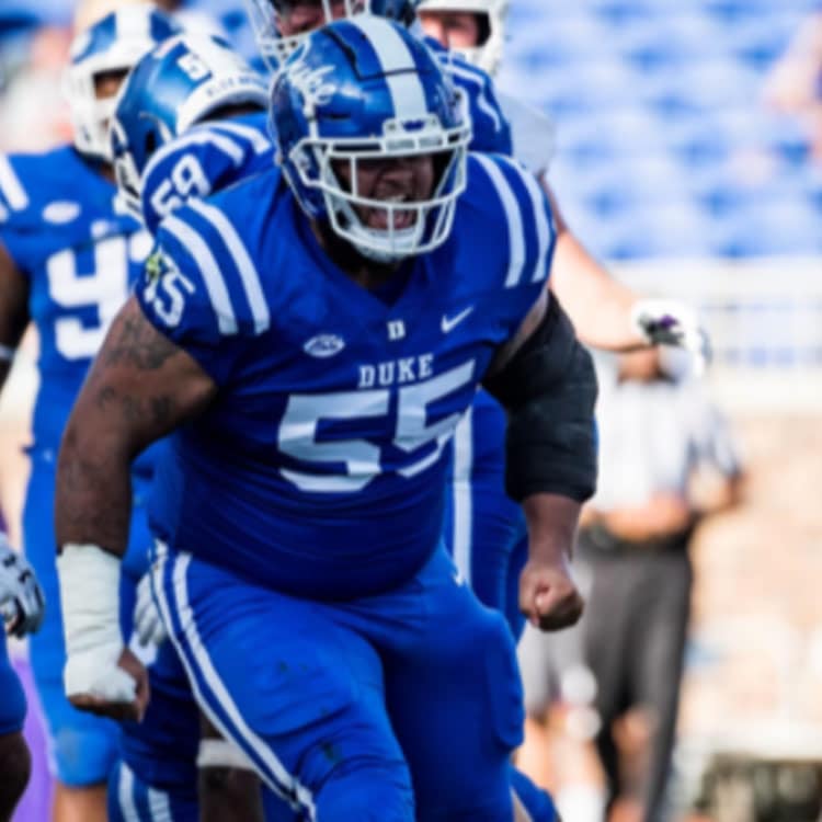 Ja'Mion Franklin playing football in a Duke jersey